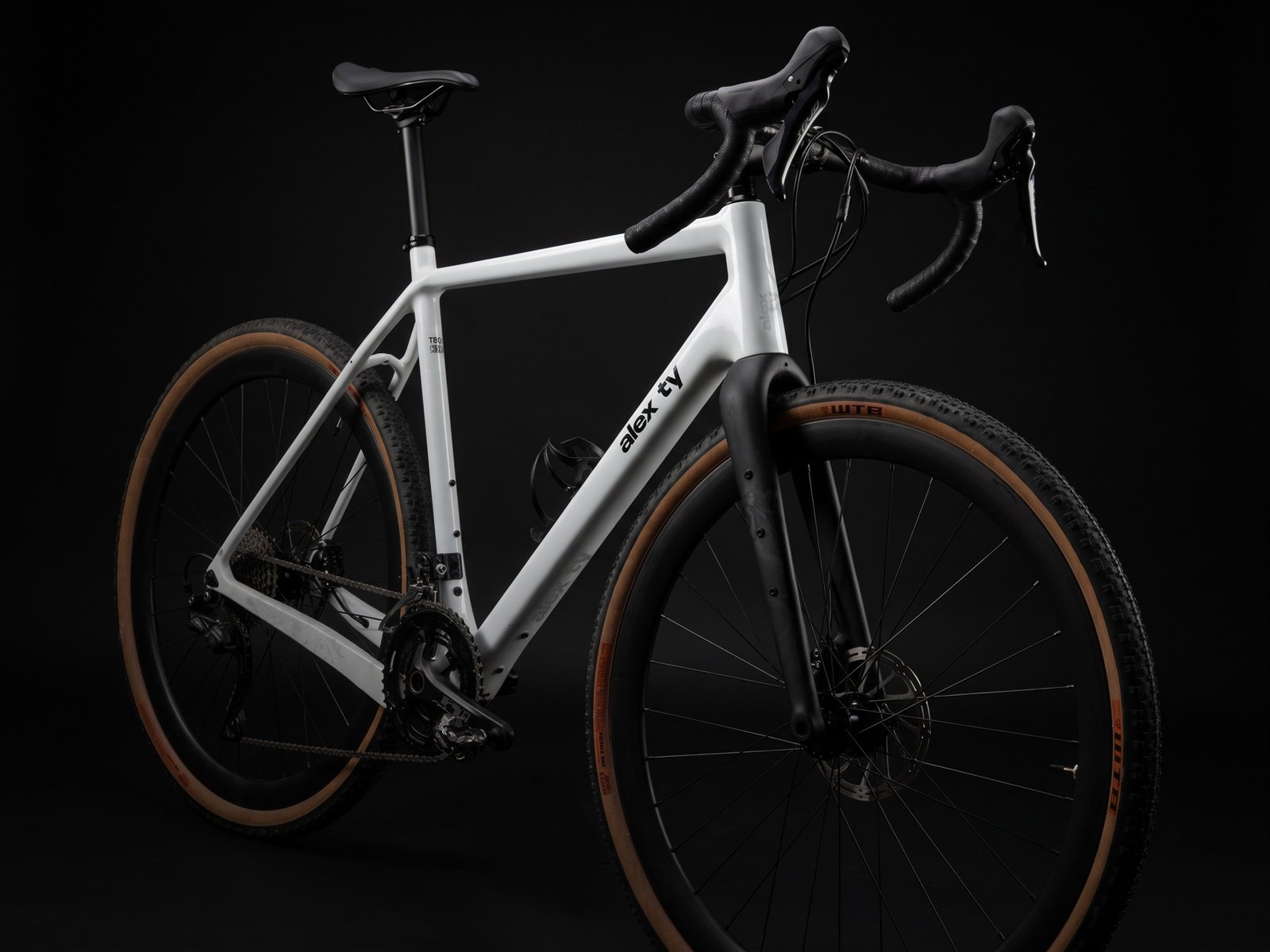 Alex Ty men’s gravel bicycle — low front three-quarter view